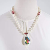 FBT - White Shell Pearls with Almond Pendant Necklace. - FashionByTeresa